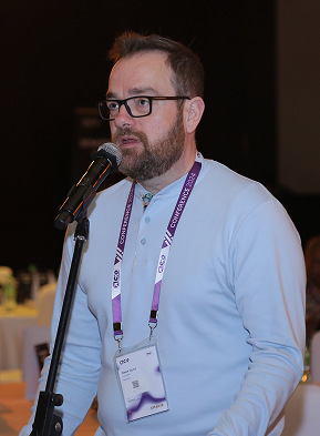 Keynote speaker at podium